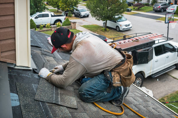 Professional Gutter Installation technician working in Lewisburg, KY